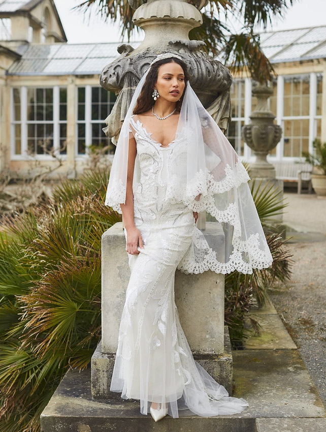 Photo of the model wearing a white gown - Desktop Image #2