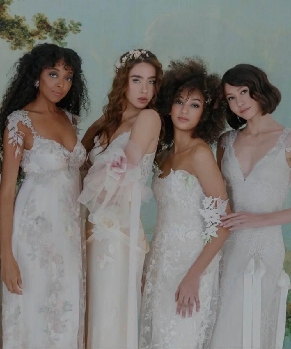 Models wearing white gowns