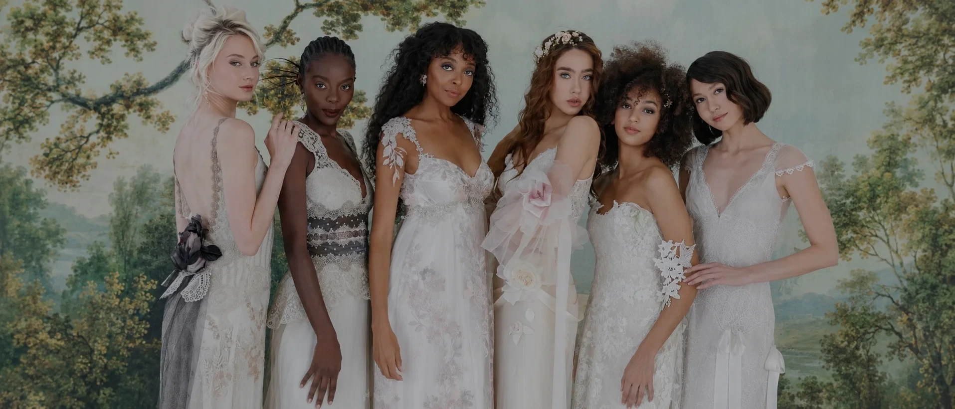 Models wearing white gowns