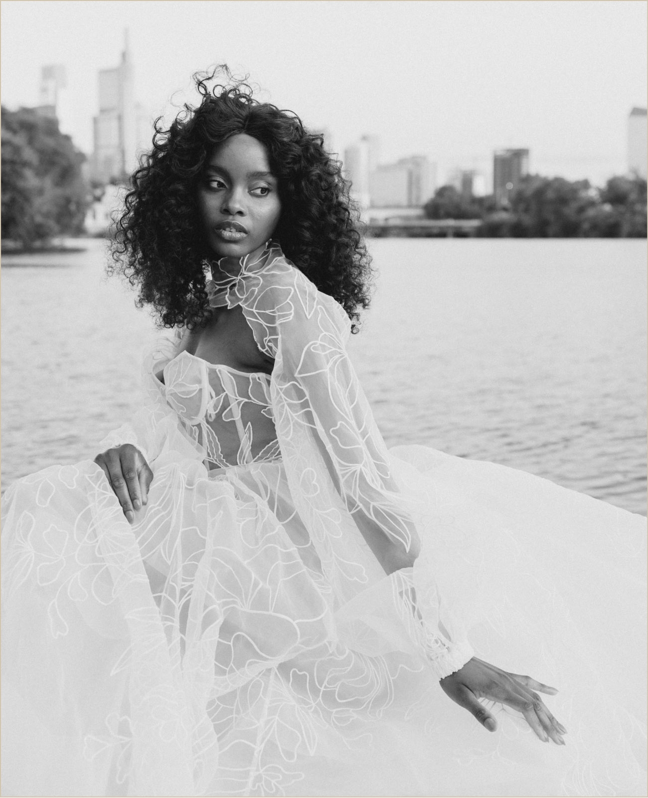 Photo of the model wearing a white gown - Desktop Image